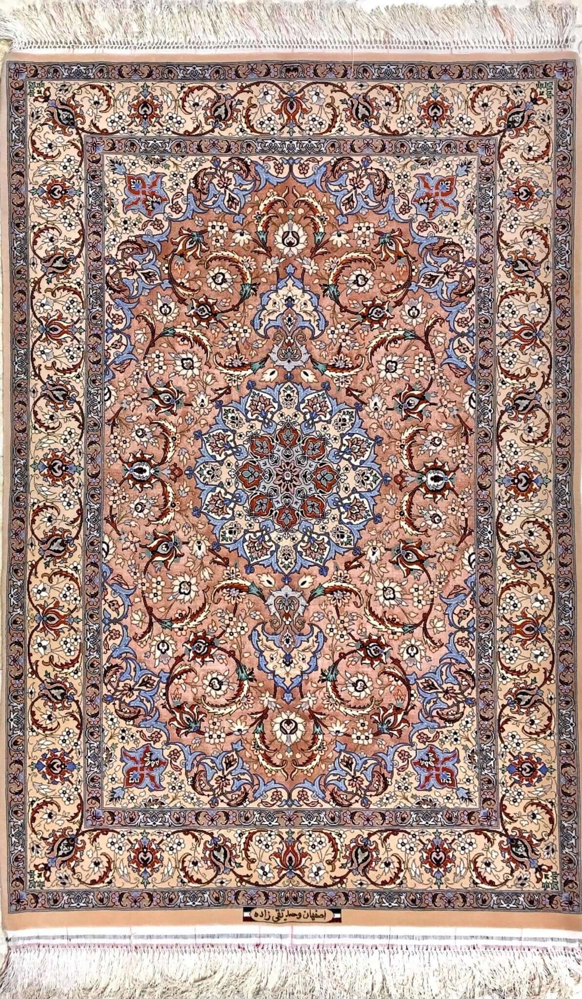 "Hand-knotted Persian Isfahan rug made of silk and wool, featuring intricate pink and blue designs. Size: 165 cm x 110 cm (5.4 feet x 3.6 feet), knot density of 810,000 knots/m². Luxurious Persian rug for home decor."